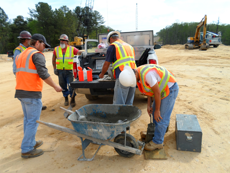 Construction workers on site at the NCDOT Fayetteville Outer Loop