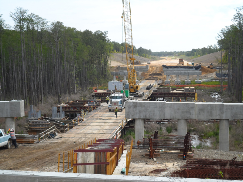 Active construction on a bridge for the NCDOT Fayetteville Outer Loop