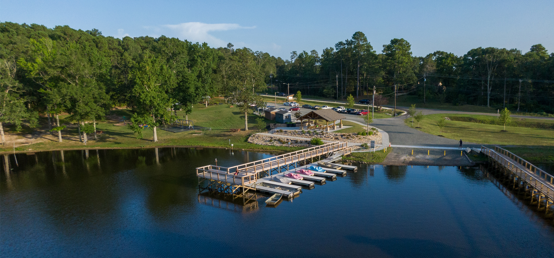 View of Lake Rogers Park dock and covered seating area.