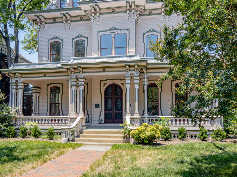 Photograph of the front door and porch of the Heck-Andrews House.