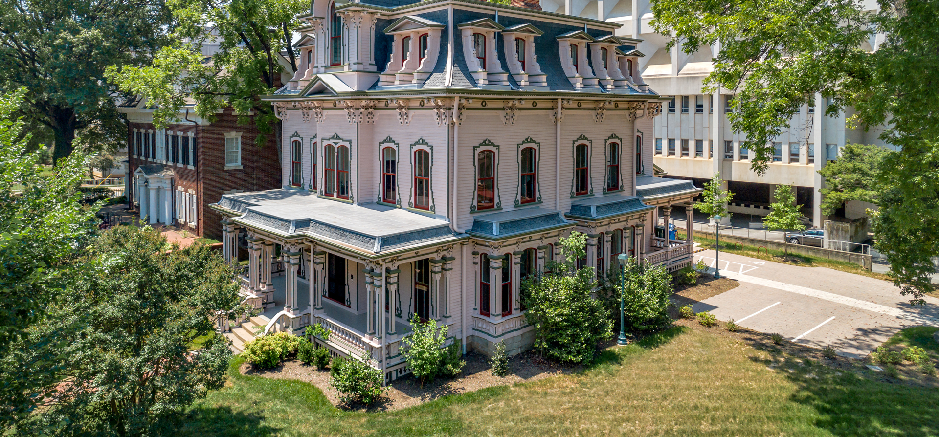 Heck-Andrews House Renovation showing the side and unique housing coloration.