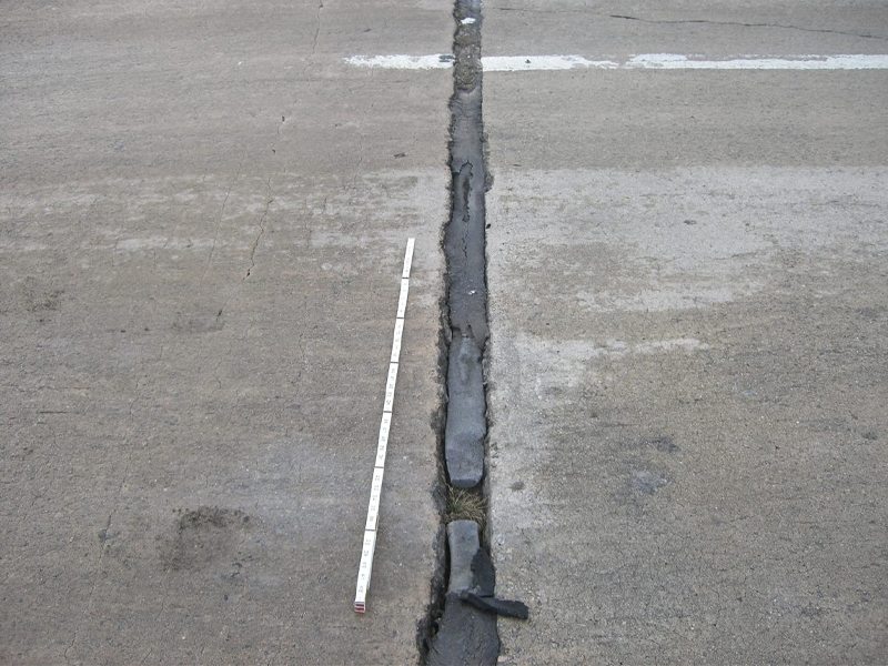 Damage to a road being inspected for the NBIS Structures Inspection.