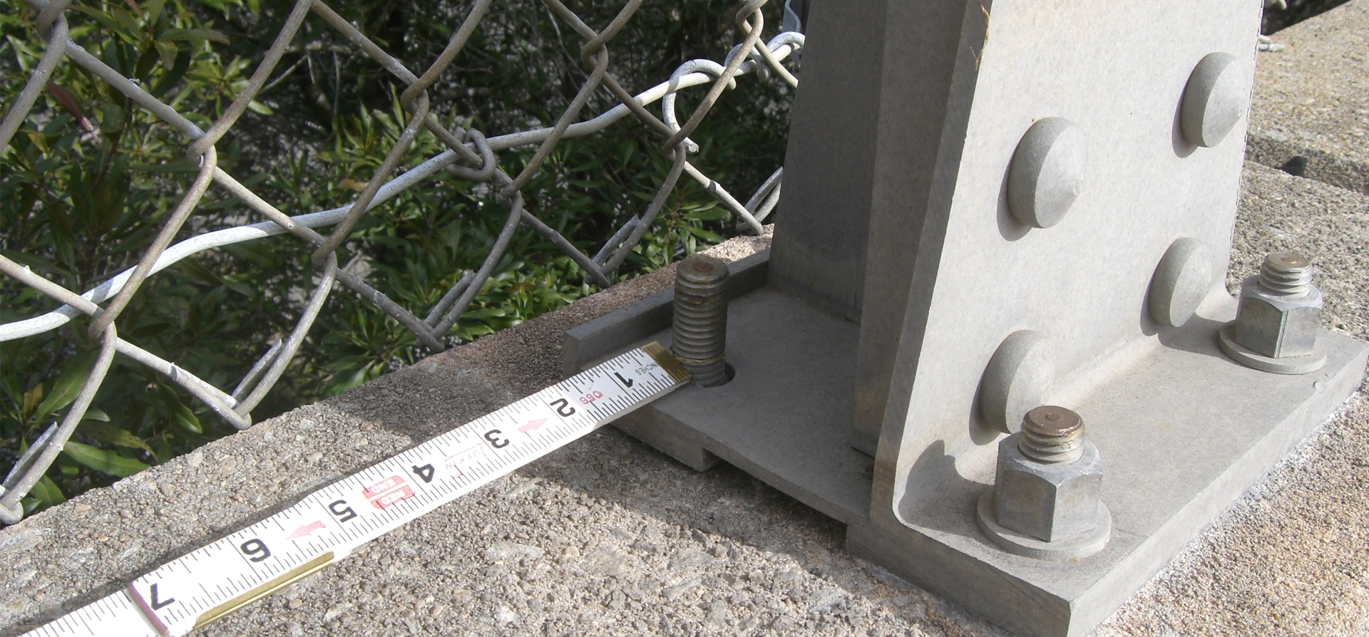 Measuring and inspecting the fences and installations for the NBIS Structures Inspection project.