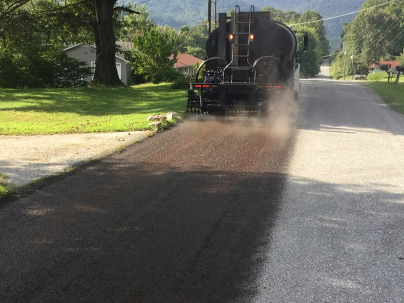 Pavement sealing in progress.